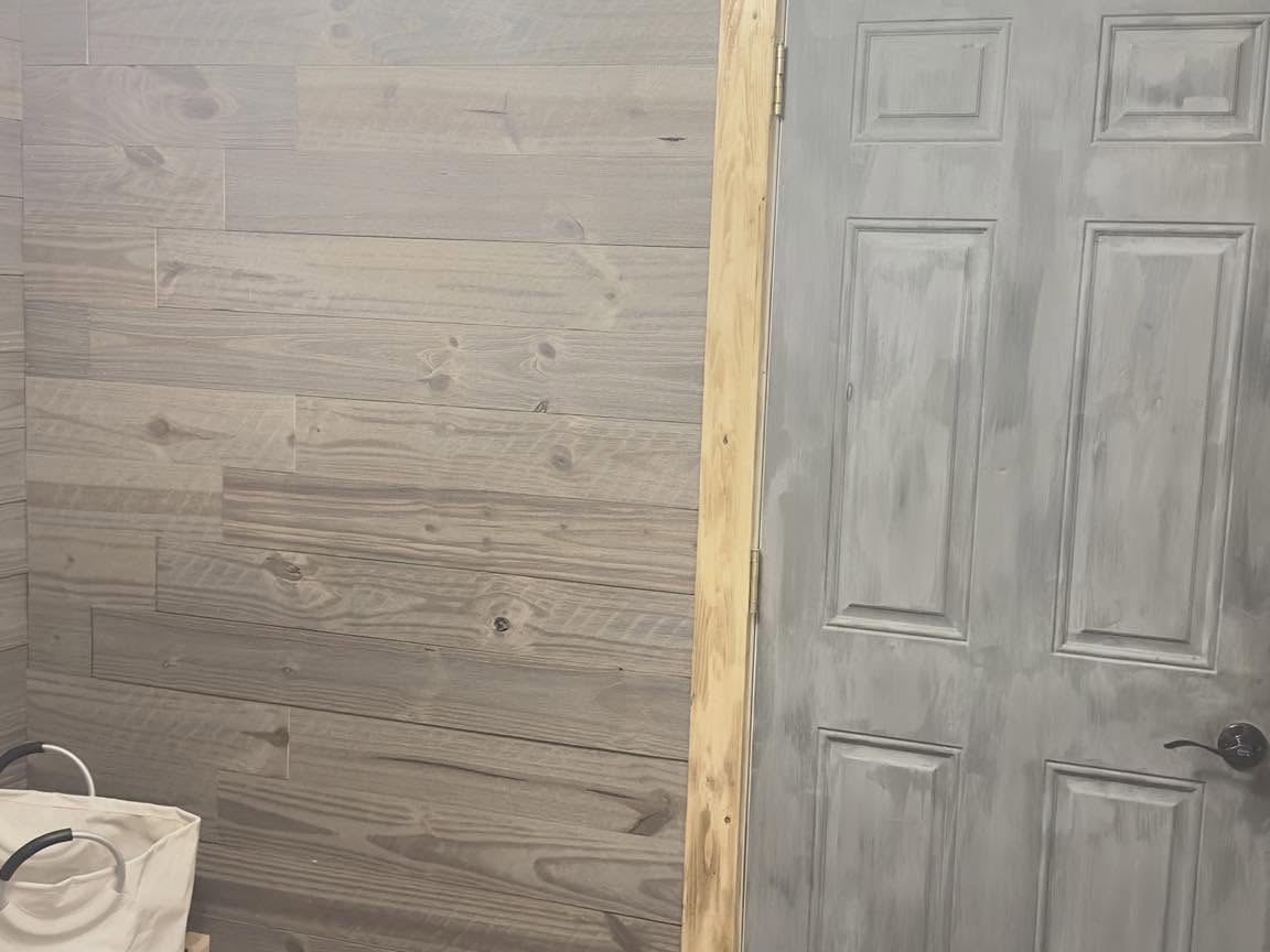 The same wall after the closet came out and a door went in