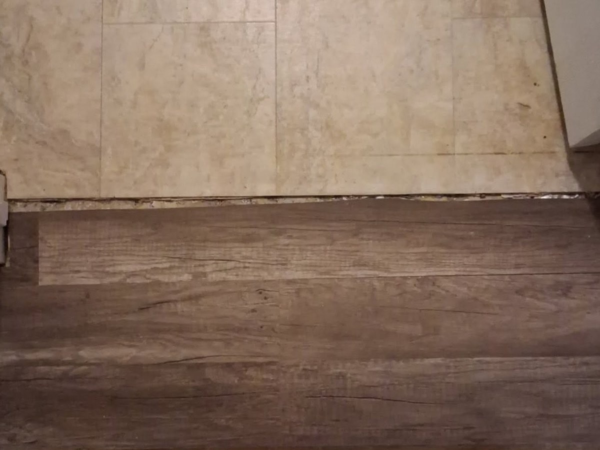 Doorway with the flooring edge left exposed and no transition