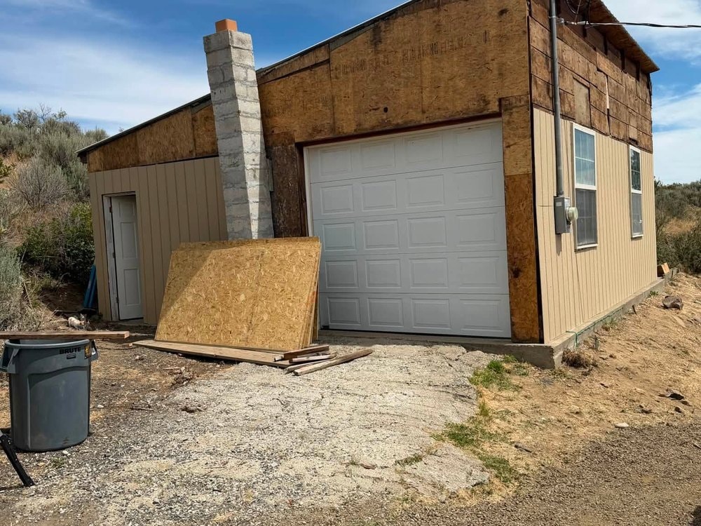 The garage door end part way through, with the block chimney left in place