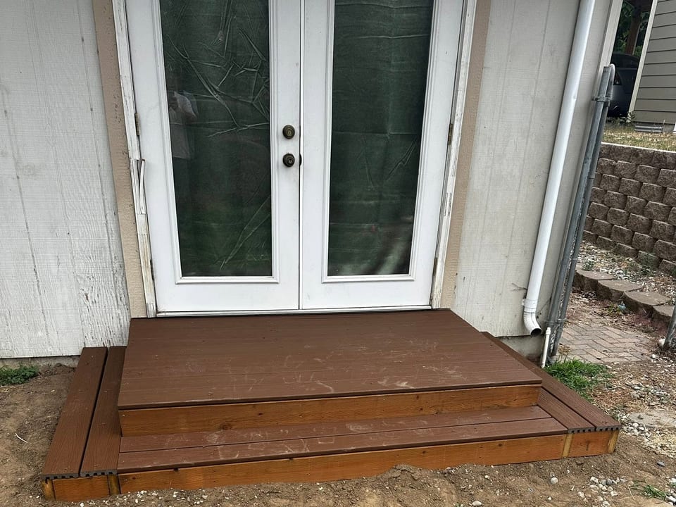 Finished deck landing at a back entry