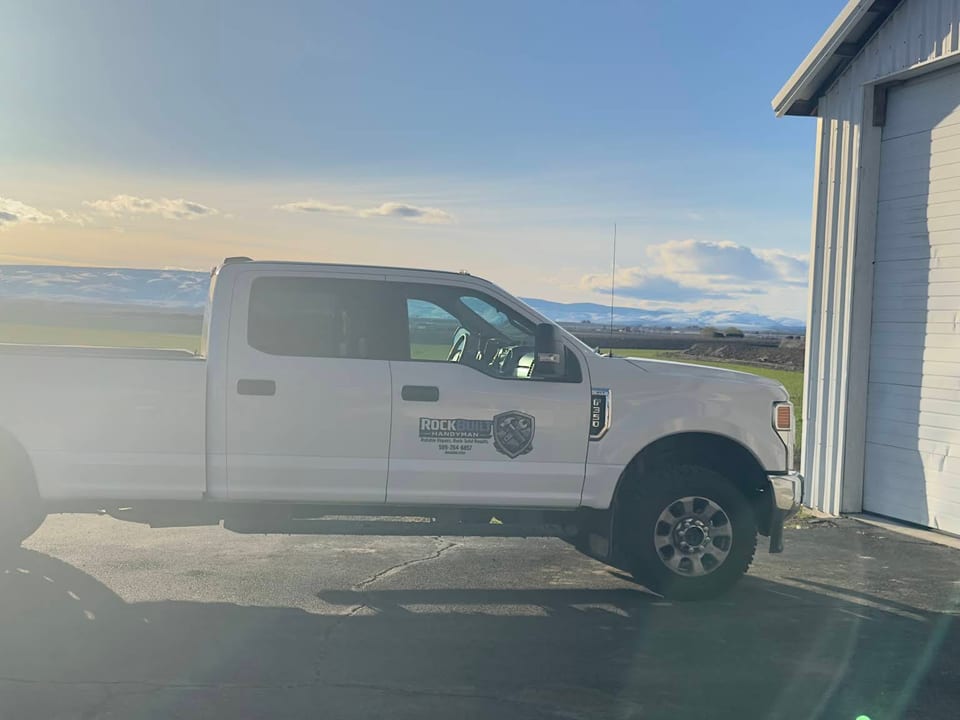 The RockBuilt Handyman work truck outside a Central Washington home